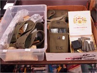 Two containers of military surplus items: rifle