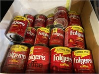 large box of folgers coffee tins
