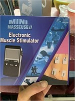 Electronic muscle stimulator mini masseuse new in