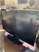 Sharp liquid crystal TV with matching sharp TV