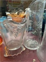 Two Glass Pitchers one has pirate face