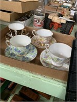 4 fancy cups and saucers one has been repaired