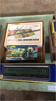 Flat of 3 train cars and accessories with boxes