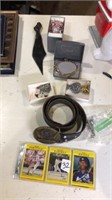 Assorted lot of jewelry, NRA belt buckle etc