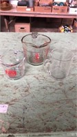 3 Anchor Hocking measuring cups. 2 cups, 1 cup, 1