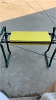 Garden bench/stool folds up to store Very useful