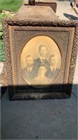 Mom, dad, and the two boys, ornate frame needs