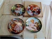 Four vintage collector plates. Sandra kuck. In