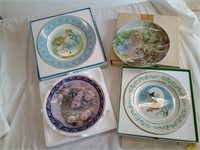 Four vintage collector plates. Two are Avon.