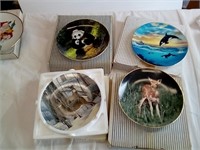 Four wildlife theme vintage collector plates.