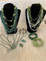 (9) necklaces (3) bracelets (2) earrings