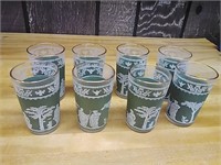 8 gold rimmed juice glasses with green art
