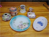 bl of Mismatched china with flower designs