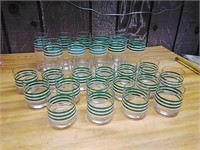 Large set of glasses made in China with green