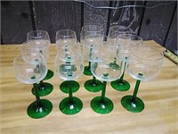 12 green wine glasses. 2 different sizes.