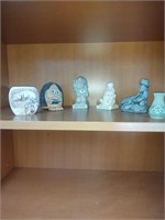 Stone figures and small vases
