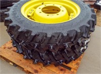 2- John Deere wheels with 9.5-24 tractor tires.
