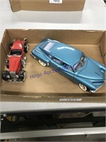 TWO METAL TOY CARS