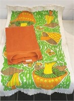 Mushroom print rug, vintage orange bath towel...
