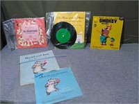 Lot of 4 Assorted Vintage 45 Vinyl and booklets.