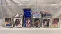 Large lot of unopened basketball cards with case.