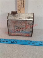 Vintage log cabin syrup tin