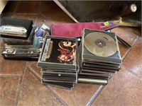 L - CDs & Cassettes