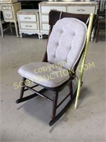 Vintage dark wood rocking chair with light brown