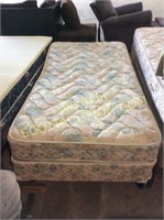 Twin mattress and foundation on Hollywood frame,