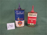 two Advertising Oil Cans