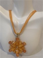 Orange nylon necklace w/ orange flower