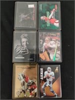 Six NFL trading cards. Steve Young and Troy