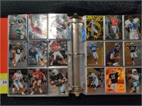 Binder full of 1995 NFL trading cards