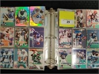 Binder full of 1996 football cards, many rookies