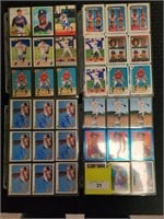 Four binder pages of signed trading cards