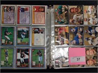 Binder of 1999 football cards w/ rookies, holos