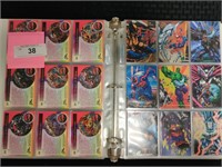 Binder full of super hero trading cards