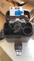 Minolta XG-M camera with case and accessories