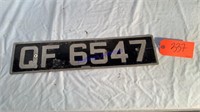 Foreign license plate, tin embossed, 5”x21”