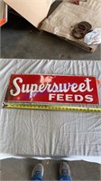Supersweet feeds - tin embossed sign - 28”x10”
