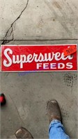 Supersweet Feeds tin sign, embossed, 28” x 10”