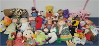 Lot of vintage dolls, stuffed animals, & more.
