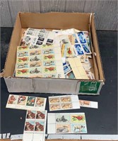 Assortment of Hundreds of U.S. Mint Stamps