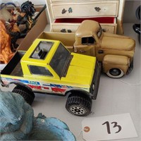 (2) Toy trucks