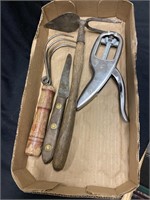 Antique garden tools and a nutcracker