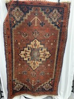 Hand woven rug 67" x 40"             (P 65)