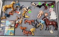 Case lot with horse figurines, including Lucas McC