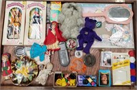 Case lot with dolls and accessories, sports cards,