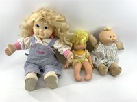 3 Assorted dolls, 1 is cabbage Patch         (P 78