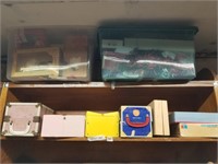 Shelf lot with dolls, Christmas decorations, trunk